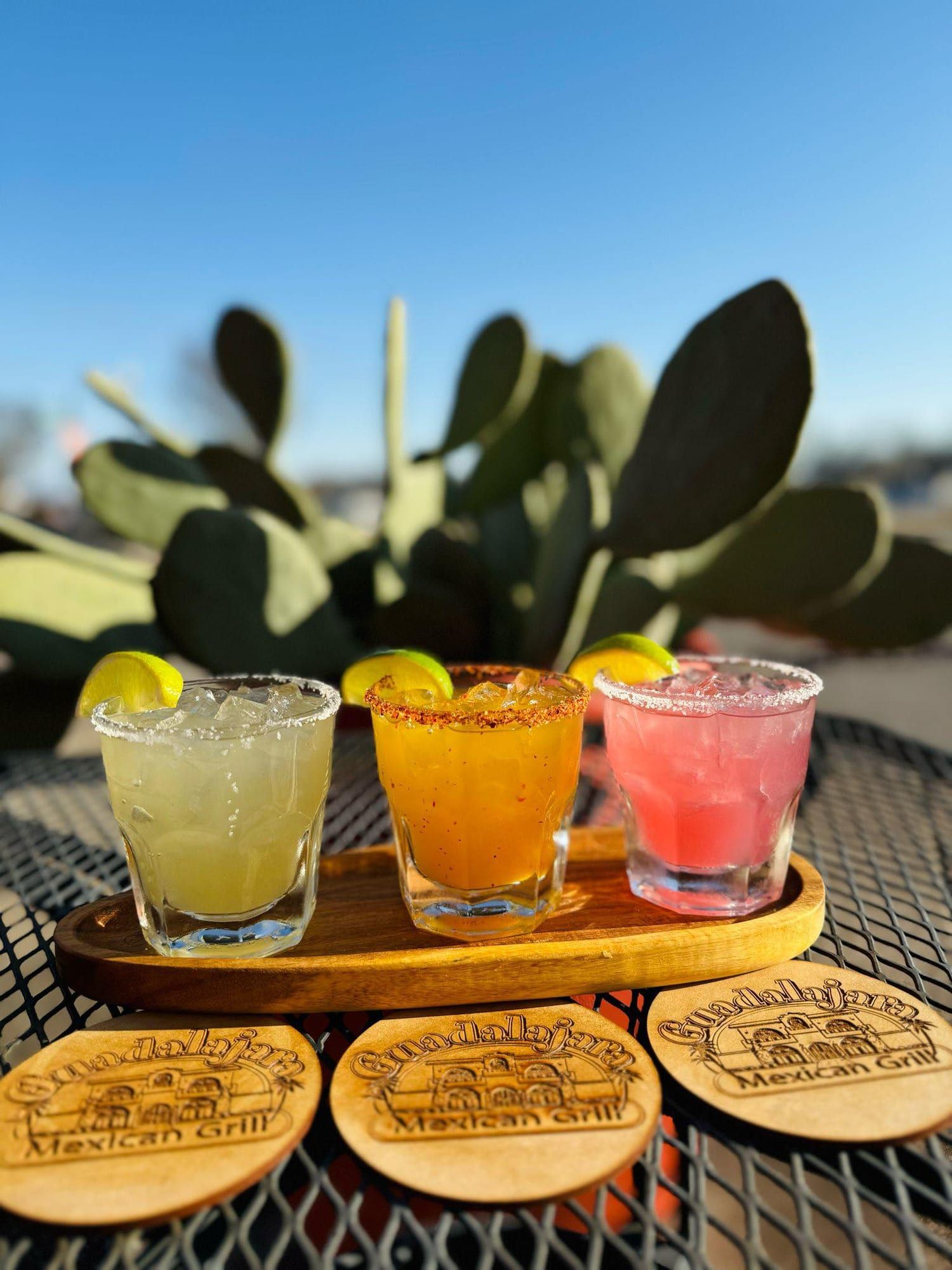 A flight of three margaritas on the patio